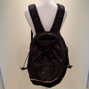 Black and gold pink backpack